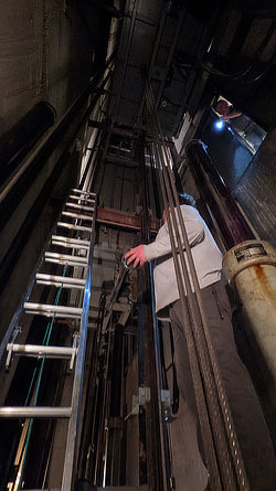 The Elevator Shaft - In the 'pit' of the shaft with elevator cars directly above.