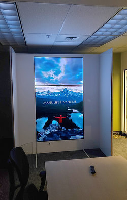 Pioneering 'The Impossible' — This prototype was crucial in the development of the Manulife elevator video wall systems. By situating the mockup within a controlled office environment, I was able to conduct the network engineering and electronics integration with precision, shielded from the potential physical hazards of the production floor. As the housing panel was still in development, these three delicate LG Wallpaper OLED displays —valued at ~$9,500 each— remained exposed to impact damage without the protection of safety glass.